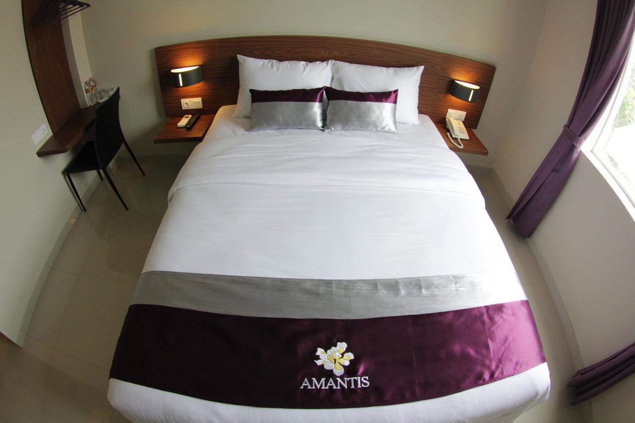 Amantis Hotel Demark Quarto foto
